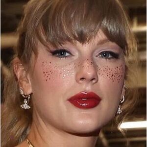 Taylor Swift Chiefs game earrings Silver tone with CZ’s ORB TTPD